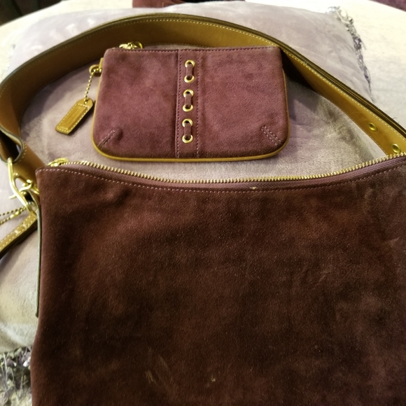 Burgundy Coach purse and wristlet
